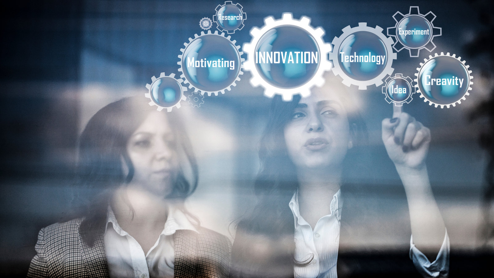 Two women innovating with gear images