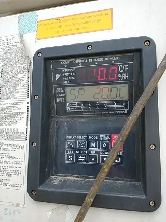A reefer control panel photographed by the driver, showing the set point and supply temperature